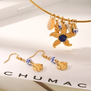 Set di gioielli in acciaio inossidabile dorato con collana stella marina e orecchini pesce