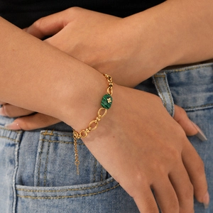 Bracelet vintage en acier inoxydable doré avec pierre de malachite et détail de fleur