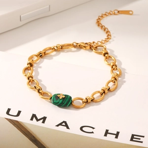 Bracelet à maillons en acier inoxydable doré avec pierre de malachite et détail fleur