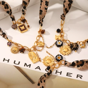 Bohemian leopard fabric and gold chain necklace set with vintage sun and heart charms