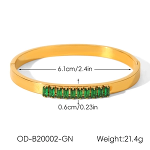 Detail view of 18k gold plated bangle with 10 green zircon stones and size dimensions