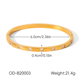 Detail view of 18k gold plated stainless steel zircon bangle with precise dimensions