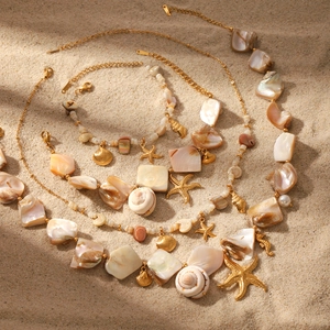 Set bohémien di collana e bracciale in acciaio inossidabile con conchiglie e stelle marine