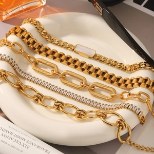Five assorted 18K gold plated stainless steel bracelets with zircons and shell inlay