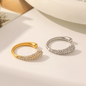Detail of minimalist open rings in gold and silver finish with sparkling pave zircons