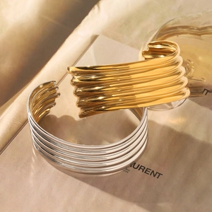 Classic minimalist multi-layered open cuff bracelet in polished gold and silver steel finish