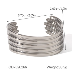 Detailed view of layered silver cuff bracelet with dimensions 6.75cm diameter and 3.07cm width