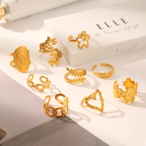 9-piece 18K gold plated stainless steel ring set with heart and leaf minimalist patterns