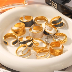 Artistic gold stainless steel open rings with enamel detailing and wave patterns
