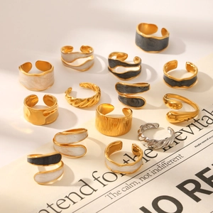 Golden and silver minimalist stainless steel rings with drip oil marble textures