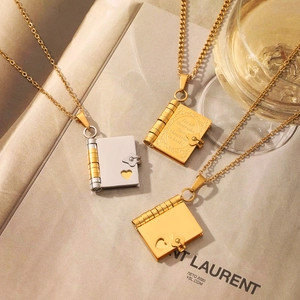 Romantic book pendant necklace in gold stainless steel with heart detail and quote
