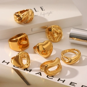 Polished gold stainless steel thick rings set in various geometric and heart designs