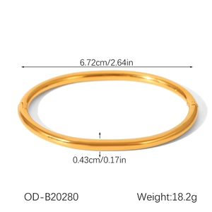 Detailed view of golden stainless steel bangle with dimensions and weight specifications