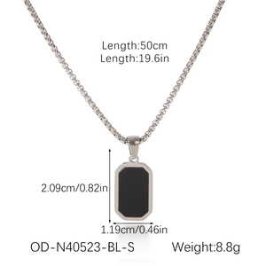 Detail view showing black rectangle pendant on box chain with exact dimensions in cm and inches