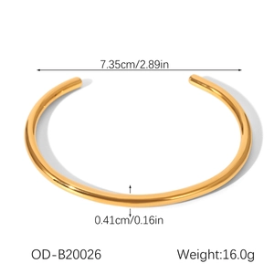 Polished gold stainless steel cuff bracelet showing 7.35cm diameter and 16.0g weight