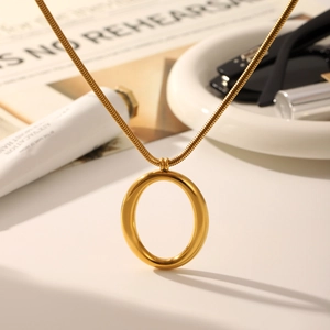 Chic gold-plated round hoop pendant necklace with snake chain for modern women's jewelry style