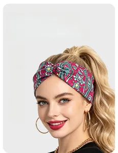 Red paisley yoga headband featuring quick-dry breathable fabric and front twist knot