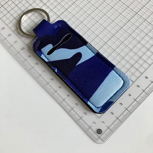 Blue camo neoprene keychain sleeve holder with silver ring and precise scale guide