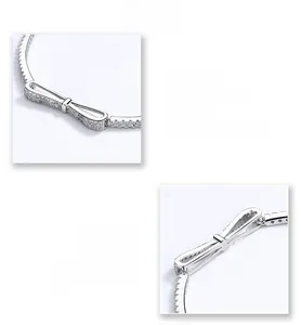 Macro detail of silver bow bracelet with micro-p鑲ed zircon and S925 sterling silver finish