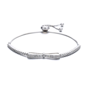 Adjustable 925 silver bolo bracelet with a zircon-encrusted bow charm for women