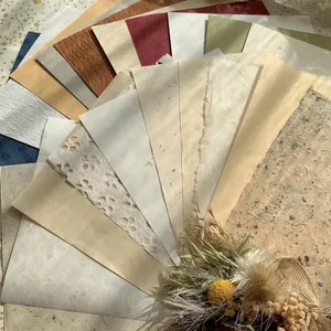 Vintage textured specialty paper set for journaling including washi and fiber materials
