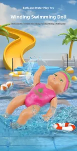 Close-up of wind-up swimming doll toy with whale pattern swimsuit and movable joints