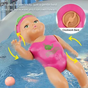 Wind-up swimming doll toy for kids bath time featuring a cute pink whale swimsuit design