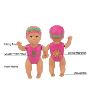 Wind-up swimming doll bath toy with rotating arms and waterproof plastic mechanism