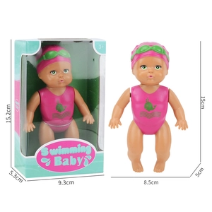 Wind-up swimming baby doll toy with pink swimsuit and goggles for bath time fun