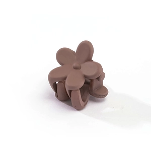 Detailed view of coffee brown matte flower hair claw clip with 45-degree angle