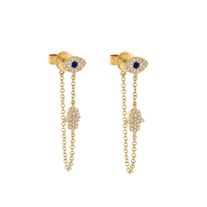 Detailed view of gold evil eye and Hamsa hand earrings with 14K hallmark and blue zircon