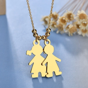 Polished gold stainless steel boy and girl pendant necklace with metallic beads