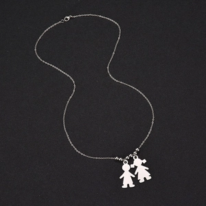 Polished stainless steel necklace featuring boy and girl silhouettes on a black background