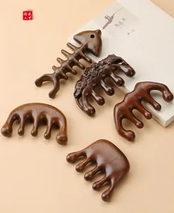 Detailed view of 5-piece sandalwood massage comb set with natural wood grain finish
