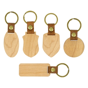 Five assorted natural wooden keychains with leather straps and bronze metal rings in 5 shapes