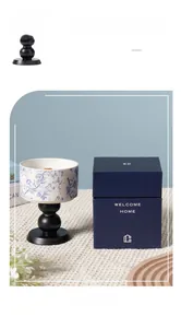 Blue floral porcelain scented candle with wooden base in a stylish gift box packaging