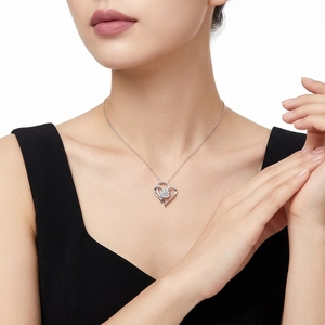 Elegant S925 silver double heart necklace with moissanite pendant worn by model