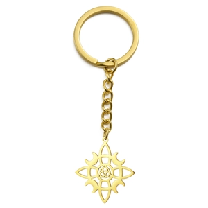 Golden titanium steel keychain with polished Celtic trinity knot pendant and geometric sun charm