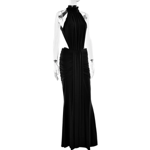 Detail of elegant black halter neck long dress with waist cut-out and pleated texture