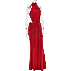 Detail of red halter neck dress with side cut-outs and ruched waistline details