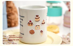 Macro shot of 3D dessert foam stickers on a cup showing adhesive backing details
