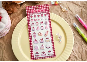 Detailed macro view of 3D strawberry dessert foam stickers for creative scrapbooking