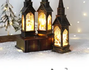 Detail of vintage Christmas lantern with warm LED glow and festive painted scenes