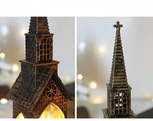 Detail of vintage bronze Christmas lantern with Gothic design and warm LED glowing windows