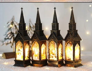 Set of four church-shaped Christmas LED lanterns with snowmen and reindeer scenes