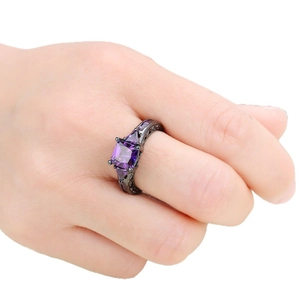 Gothic style black gold ring with square purple zircon and filigree hollow detailing