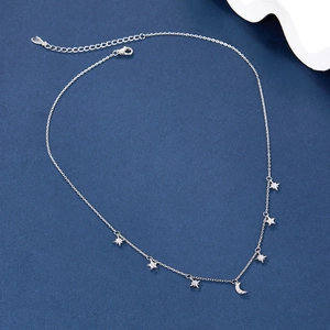 Detail view of S925 silver necklace with five star charms and a crescent moon pendant