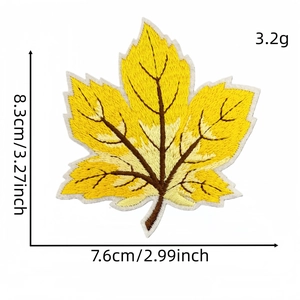 Close-up view of yellow maple leaf embroidered patch showing dimensions 8.3x7.6cm