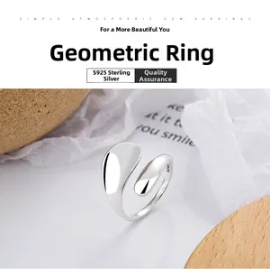 Detailed view of irregular geometric S925 sterling silver ring with polished finish