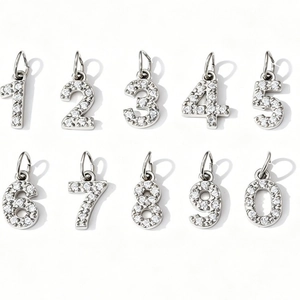 Set of professional sparkling silver number charms 0-9 with cubic zirconia inlay